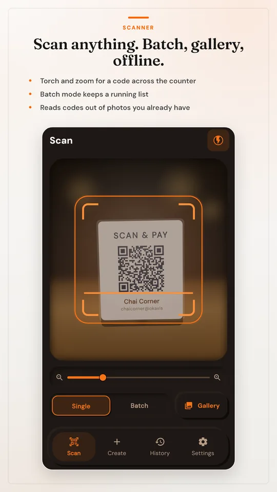 The scanner in Midnight Orange reading a Chai Corner standee.